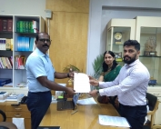 Mr. Prabhanand Hegde of CFAR and Kathyayini Chamaraj of CIVIC handing over Memorandum to Mr. Manivannan, Labour Secretary